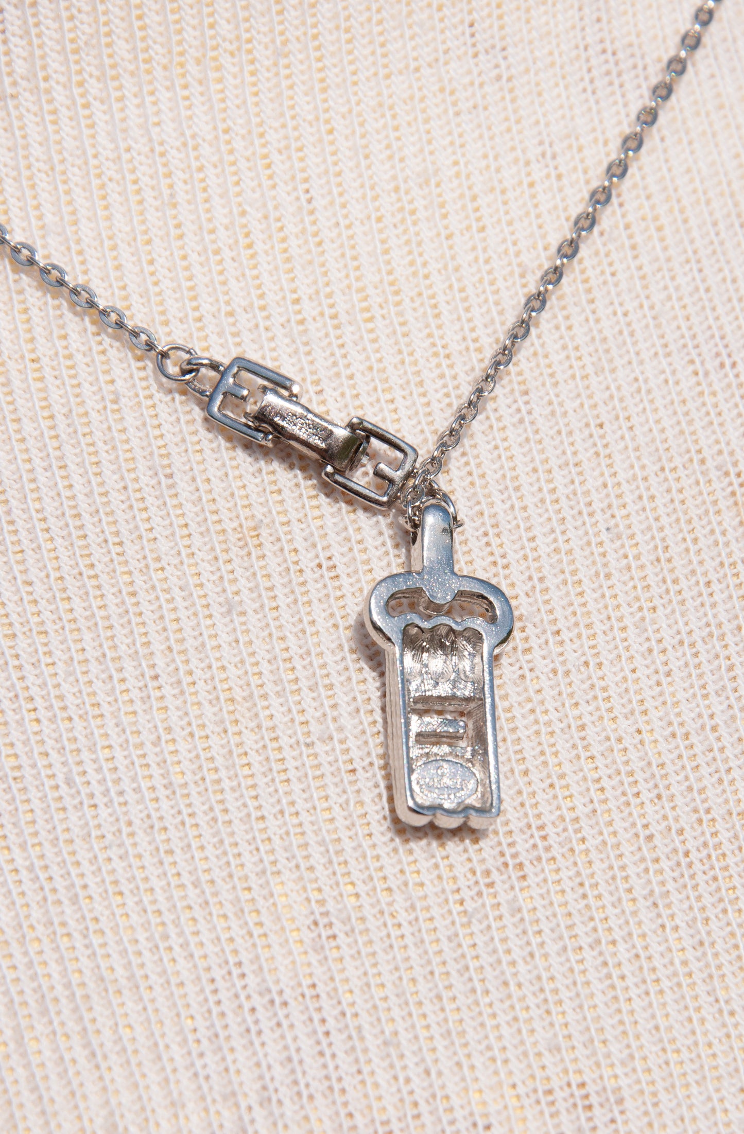 GIVENCHY VINTAGE TINY SILVER LOGO NECKLACE